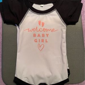 Cricut homemade baby onesie.